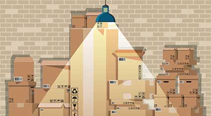 Illustration of stacked boxes against a brick wall with a pendant light hanging in the foreground