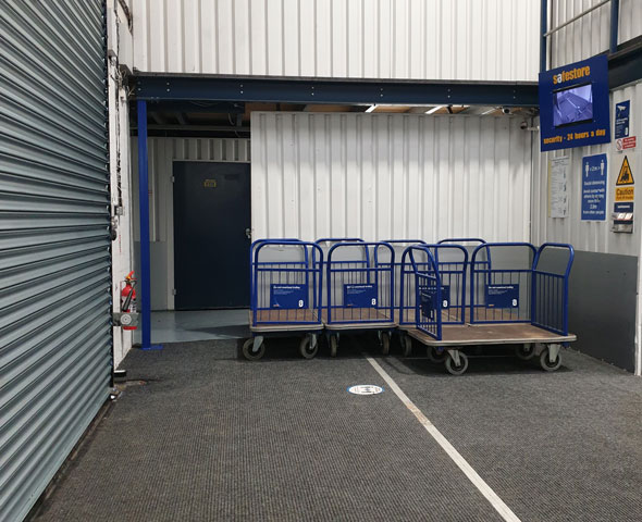 Safestore self storage Milton Keynes loading bay, trolleys and a storage unit