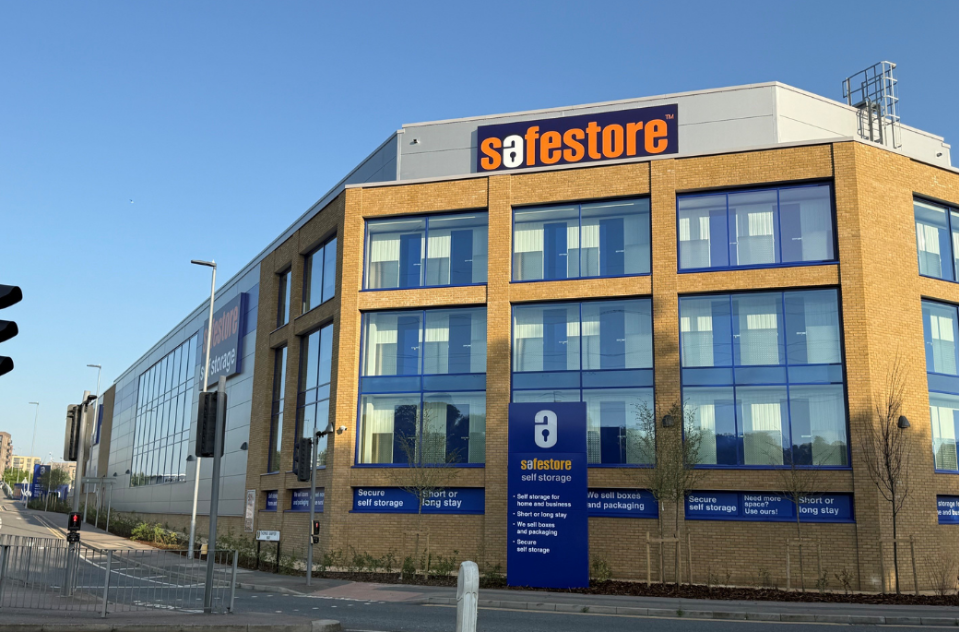 Safestore self storage store in Watford, a modern yellow-brick building with blue windows