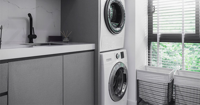 utility room storage ideas - stacked washer and drier